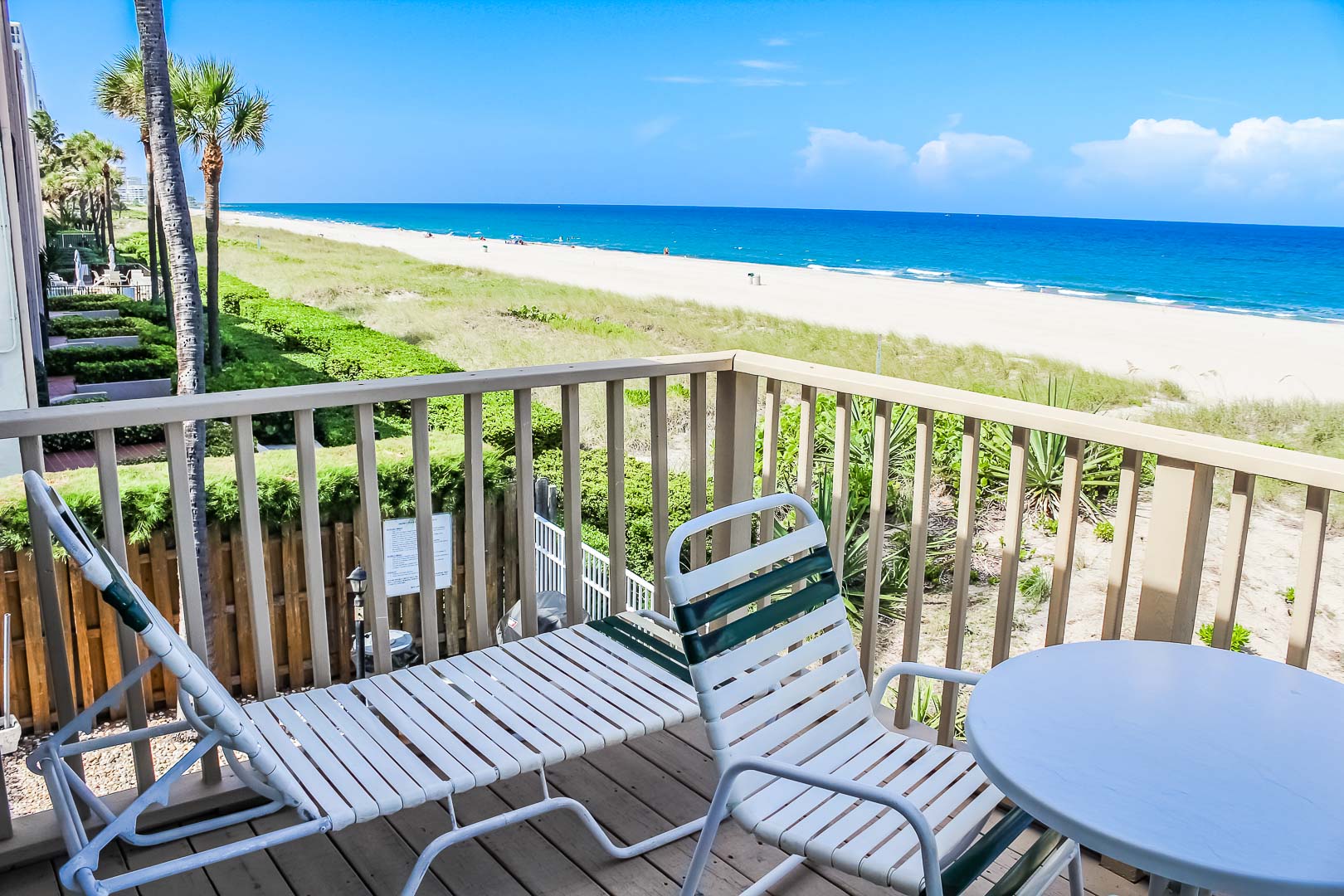 A relaxing balcony deck with a beach view at VRI's Berkshire Beach Club in Florida